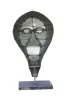 Product image 4 of the product “Small Mask on stand - Modell 3, 53cm height, sculpture from upcyceled oil barrel. ”